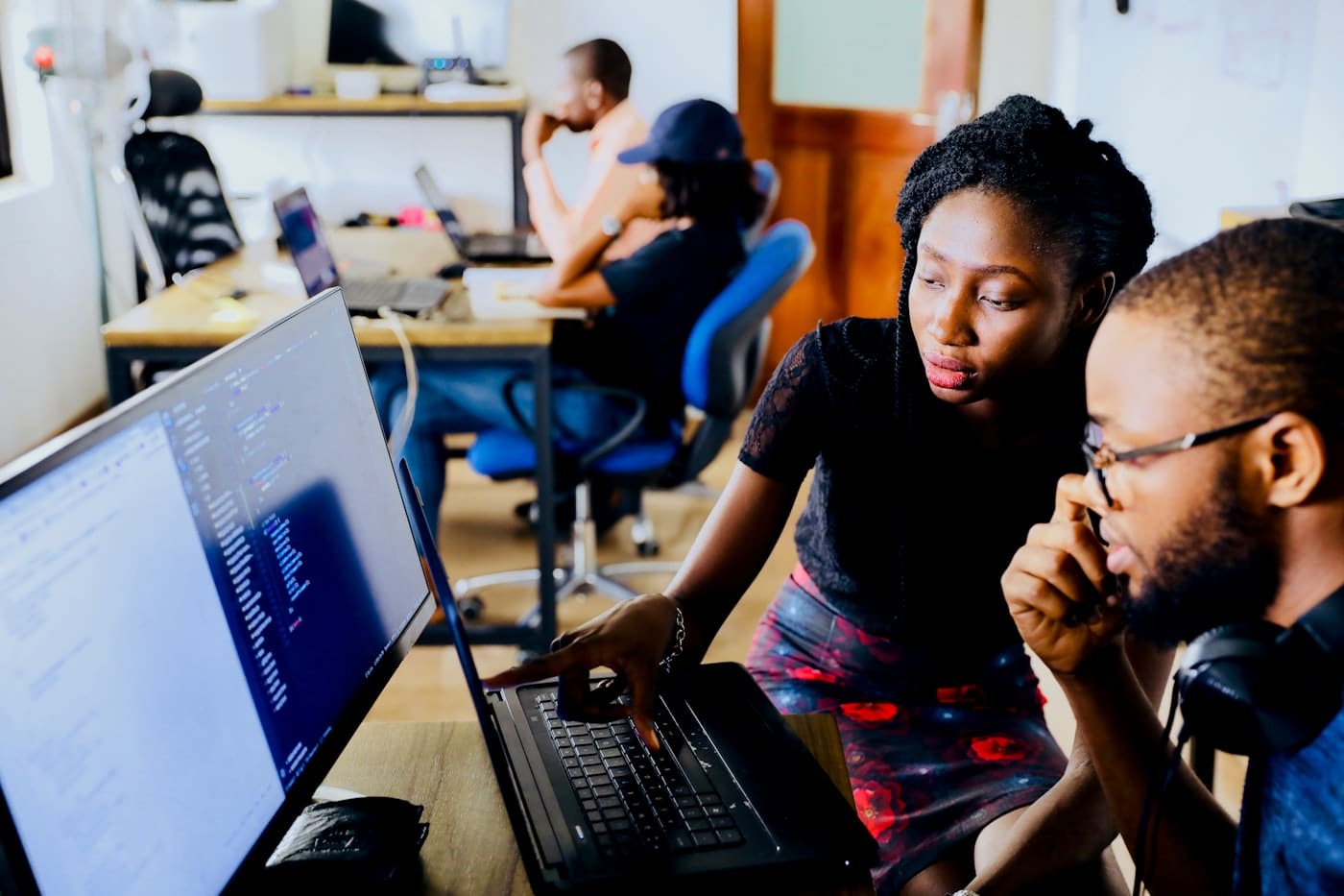 Senior engineers collaborating at Tech Buruga